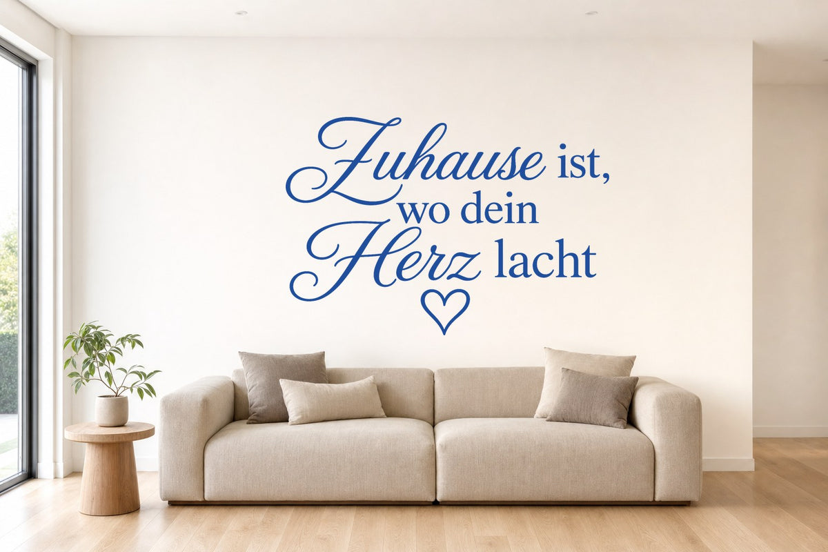 Wandtattoo „Zuhause ist, wo dein Herz lacht“ in Blau an der Wand