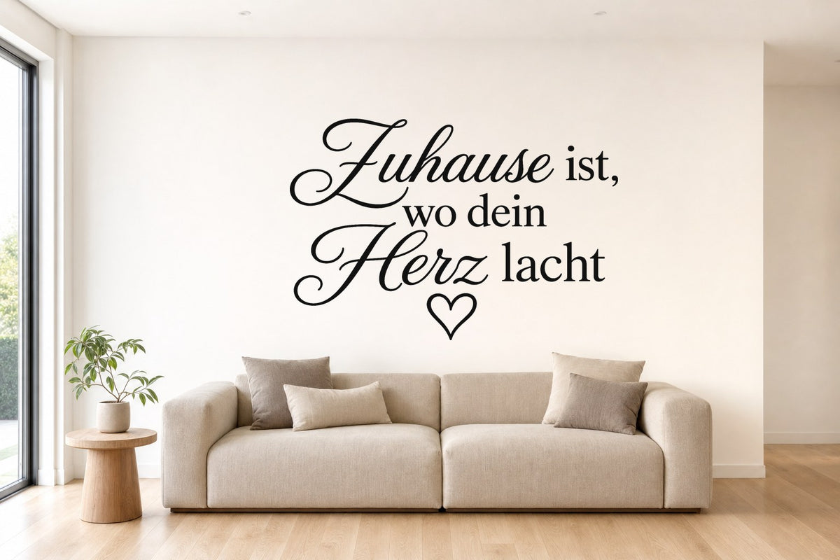 Wandtattoo „Zuhause ist, wo dein Herz lacht“ in Schwarz an der Wand