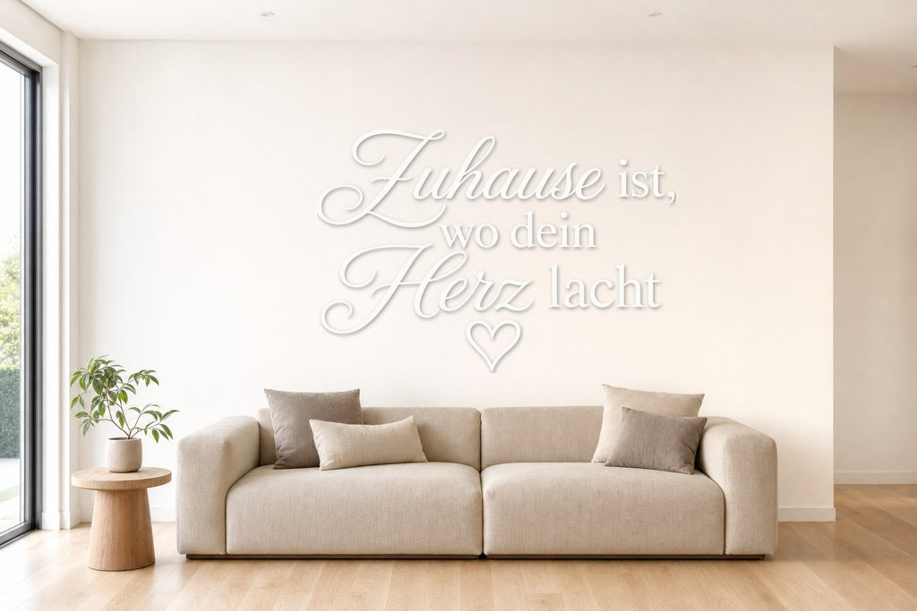 Wandtattoo „Zuhause ist, wo dein Herz lacht“ in Weiß an der Wand
